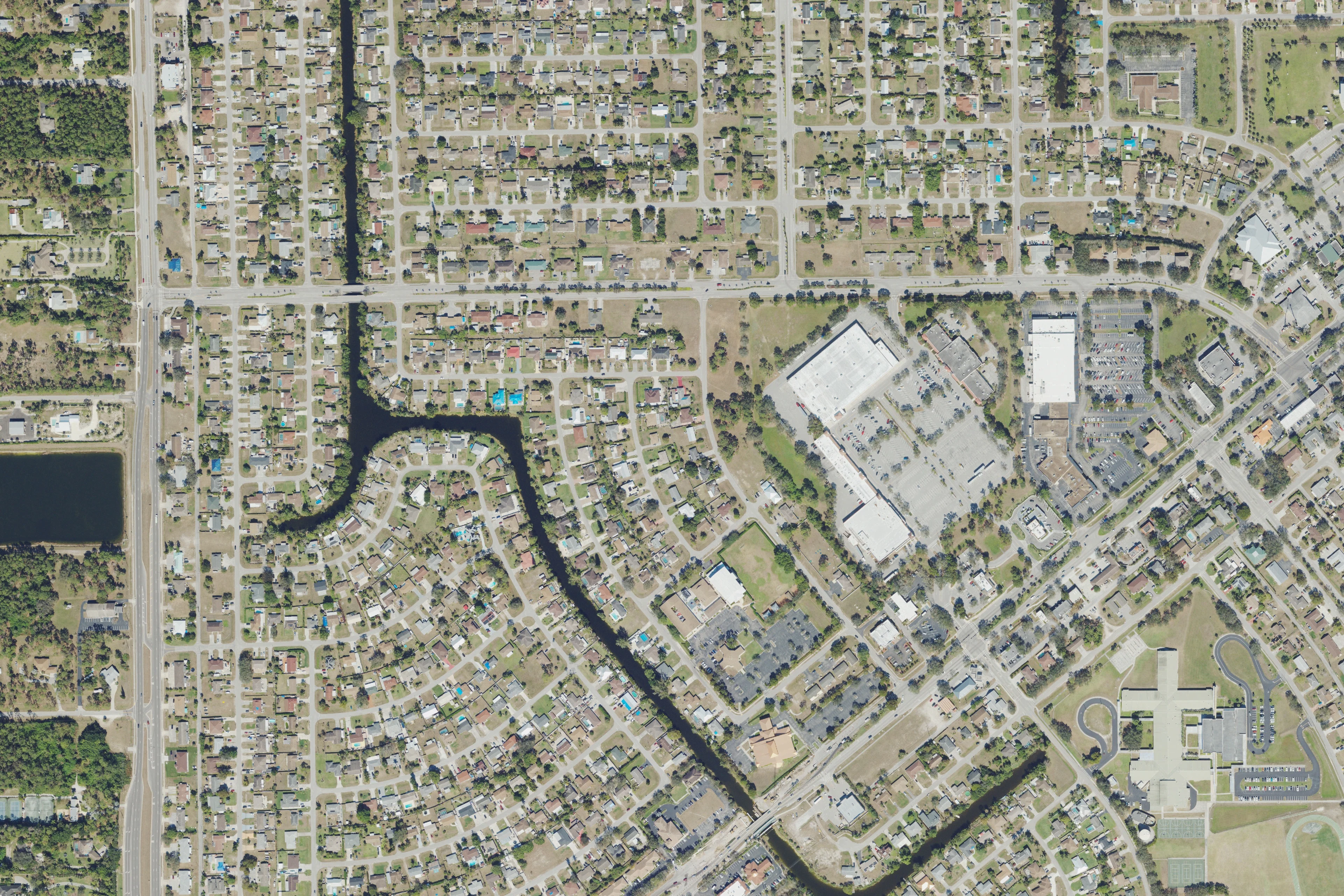 Aerial view of western Golden Gate City streets, homes and canals