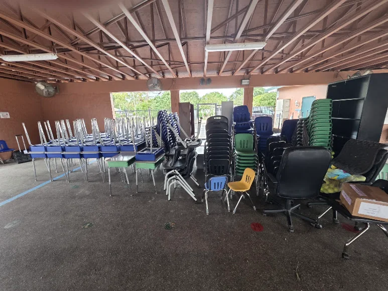 Chairs arranged inside a covered event space
