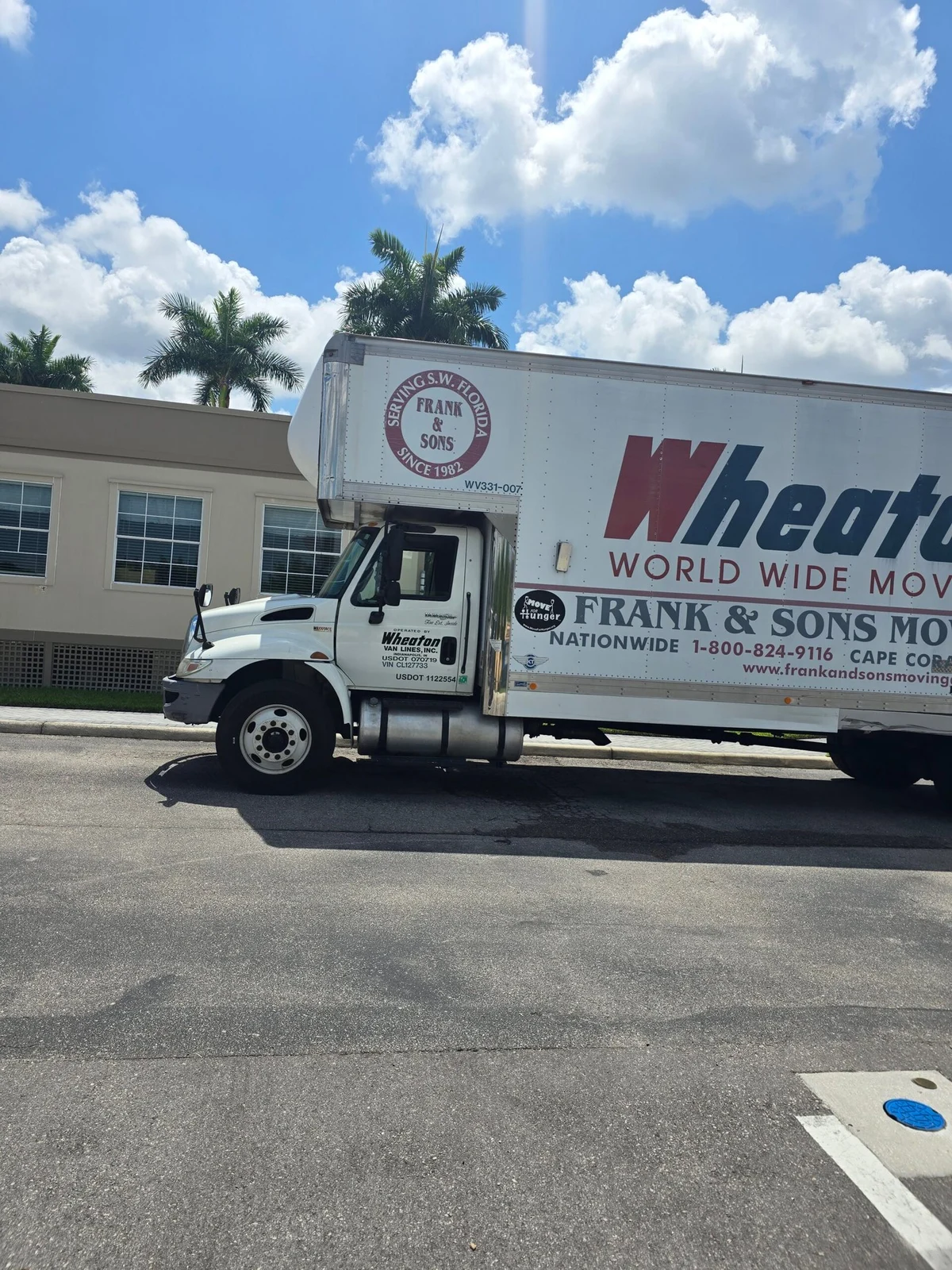 Frank and Sons moving truck with Wheaton and nationwide moving branding