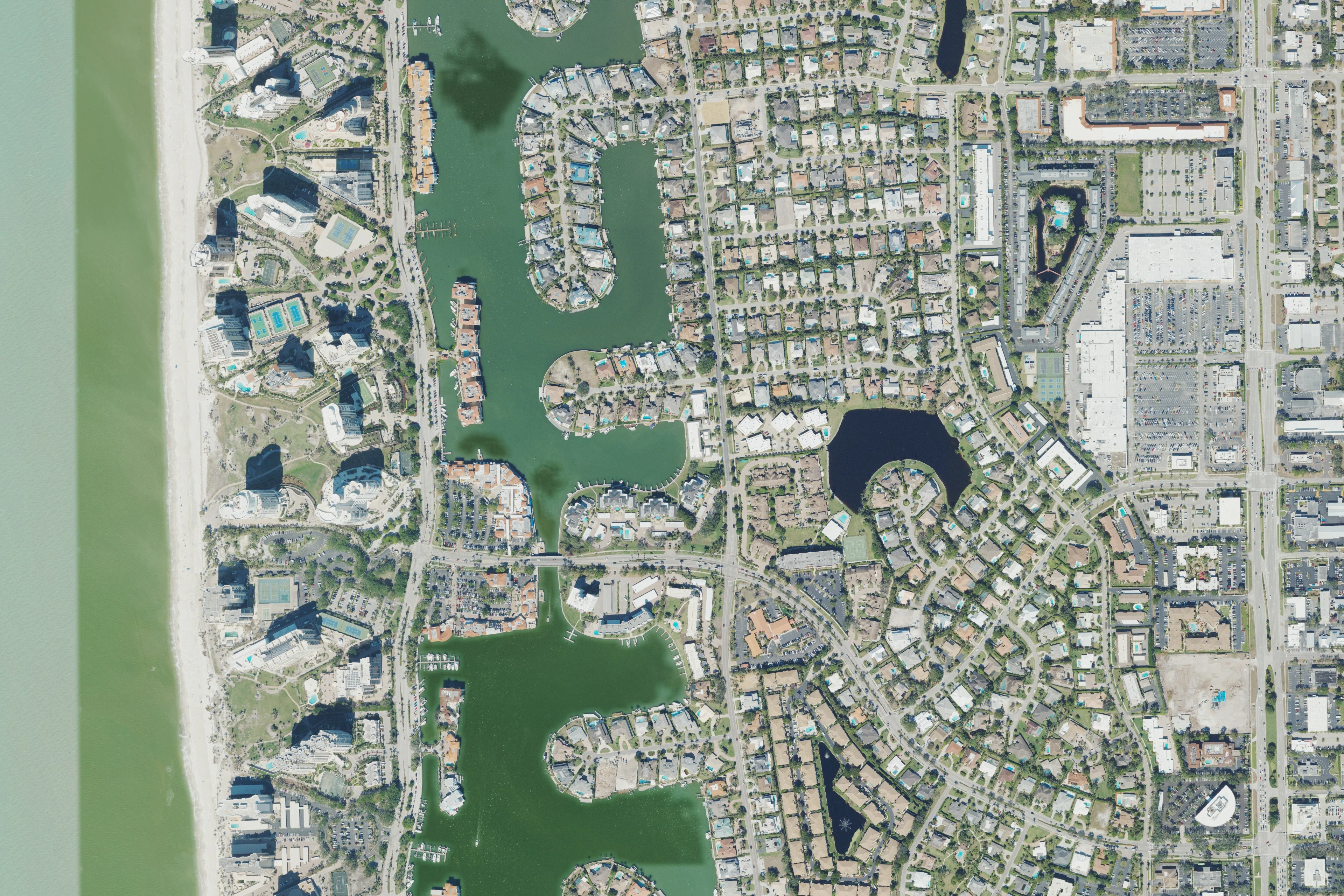 Aerial view of Park Shore homes, Venetian Bay and the Gulf shoreline