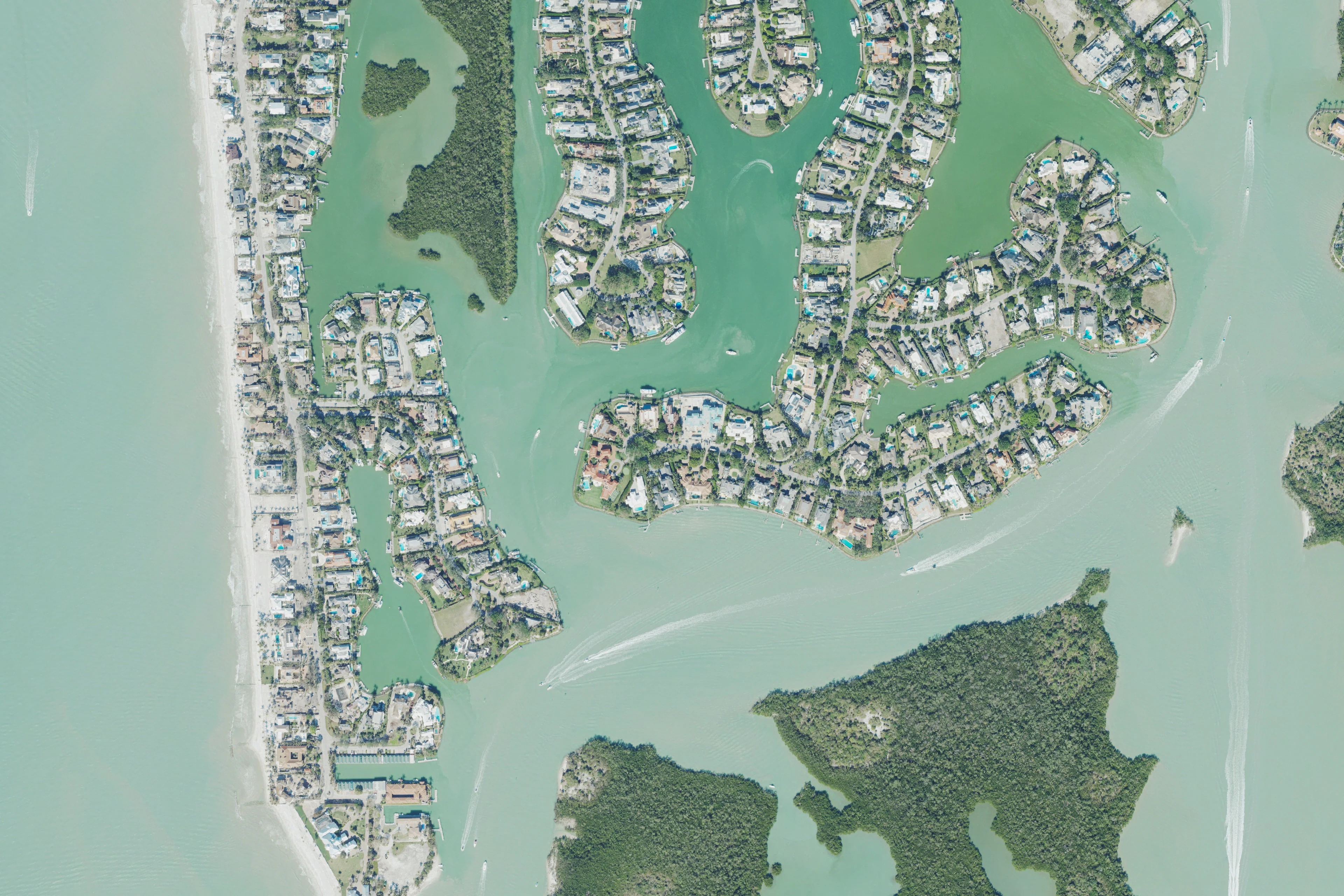 Aerial view of southern Port Royal waterfront homes and curved residential canals
